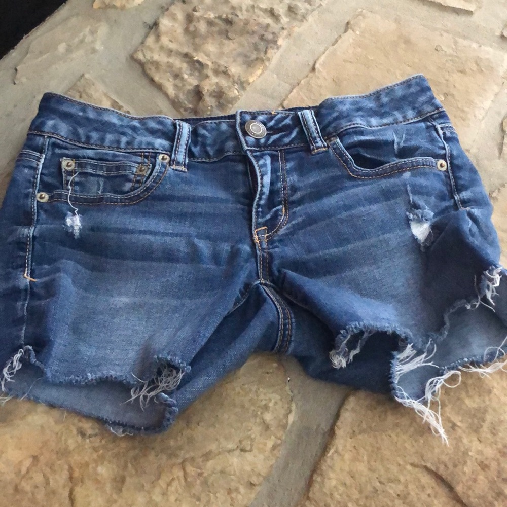 Girls distressed American eagle shorts